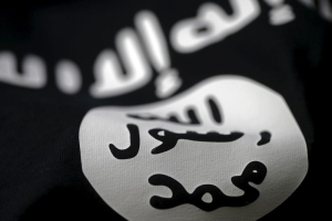 An Islamic State flag is seen in this picture illustration taken February 18, 2016. REUTERS/Dado Ruvic/Illustration <br/>