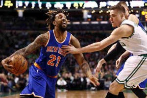 Mar 4, 2016; Boston, MA, USA; New York Knicks forward Derrick Williams (23) drives to the hoop against Boston Celtics forward Jonas Jerebko (right) during the first half at TD Garden.  <br/>Mark L. Baer-USA TODAY Sports