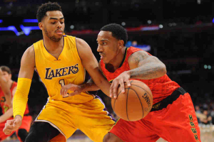 March 4, 2016; Los Angeles, CA, USA; Atlanta Hawks guard Jeff Teague (0) moves the ball against Los Angeles Lakers guard D'Angelo Russell (1) during the second half at Staples Center.  <br/>Gary A. Vasquez-USA TODAY Sports