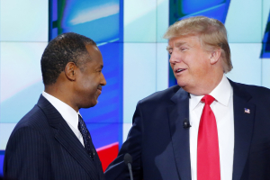Republican U.S. presidential candidate businessman Donald Trump (R) talks with Dr. Ben Carson (L) during a commercial break during the Republican presidential debate in Las Vegas, Nevada in this December 15, 2015 file photo.  <br/>REUTERS/Mike Blake/Files