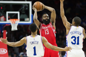 Mar 9, 2016; Philadelphia, PA, USA; Houston Rockets guard James Harden (13) attempts to pass against the defense of Philadelphia 76ers guard Ish Smith (1) and guard Hollis Thompson (31) during the second half at Wells Fargo Center. The Rockets won 118-104. Bill Streicher-USA TODAY Sports <br/>