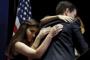 U.S. Senator and former Republican presidential candidate Marco Rubio hugs his family after he announced that he is suspending his campaign at an event in Miami, Fla., March 15, 2016. <br/>REUTERS/Carlo Allegri
