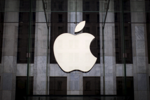 An Apple logo hangs above the entrance to the Apple store on 5th Avenue in New York City, in this file photo taken July 21, 2015. REUTERS/Mike Segar <br/>