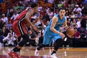 Mar 17, 2016; Miami, FL, USA; Charlotte Hornets guard Jeremy Lin (7) dribbles the ball against Miami Heat guard Josh Richardson (0) during the first half at American Airlines Arena. Steve Mitchell-USA TODAY Sports <br/>Steve Mitchell-USA TODAY Sports