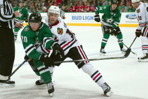 Mar 11, 2016; Dallas, TX, USA; Dallas Stars center Cody Eakin (20) and Chicago Blackhawks center Jonathan Toews (19) fight for the puck during the third period at American Airlines Center. The Stars defeat the Blackhawks 5-2. Mandatory Credit: Jerome Miron-USA TODAY Sports <br/>