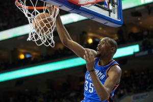 Mar 18, 2016; Philadelphia, PA, USA; Oklahoma City Thunder forward Kevin Durant (35) dunks against the Philadelphia 76ers during the second half at Wells Fargo Center. The Oklahoma City Thunder won 111-97.Mandatory Credit: Bill Streicher-USA TODAY Sports <br/>