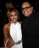 Adrienne Bailon was recently spotted showing off her killer beach body on a Mexican vacation but she wasn't alone. Gospel singer Israel Houghton joined her. Bailon broke off her engagement to her ex-fiancé Lenny Santiago last year, and Houghton last month announced his divorce from his wife of 20-plus years.   <br/>I'm in Love with a Church Girl production