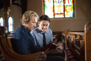 Dave (David A.R. White) counsels the inquisitive Martin (Paul Kwo) in God's Not Dead 2, a faith-based film released in theaters Friday. Photo Credit: PureFlix <br/>