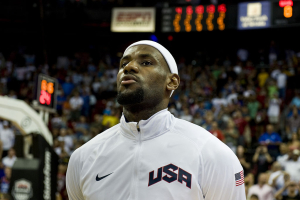 Lebron James, USA Olympic Men’s Basketball player, listens to the national anthem prior to the start of the USA versus Dominican Republic exhibition game, July 12, 2012, at the Thomas and Mack Center, Las Vegas, Nev. James is the only member of the 2012 Champion Miami Heat team on the Olympic Basketball team this year. <br/>Airman 1st Class Daniel Hughes/99th Air Base Wing/Wikimedia Commons