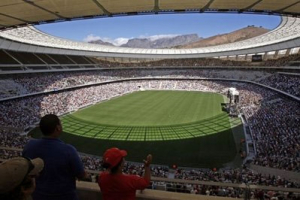 Table Mountain seen in background at the, Cape Town Stadium that will host the 2010 Soccer World Cup, Cape Town, South Africa, Monday, March 22, 2010. Around fifty thousand people attended an event at the Cape Town Stadium as part of a security test in preparation of the 2010 Soccer World Cup. <br/>AP Images / Schalk van Zuydam