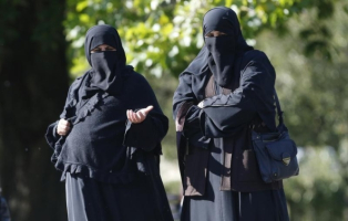 Two Muslim women in full-face veils. <br/>Reuters Photo
