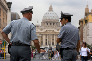 Two Italian financial policemen in front St. Peter Square. <br/>AP Photo