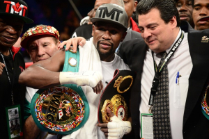 Floyd Mayweather celebrates after defeating Andre Berto (not pictured) in their WBA/WBC welterweight title bout at MGM Grand Garden Arena. Mayweather won via unanimous decision.  <br/>Joe Camporeale-USA TODAY Sports