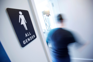 A bathroom sign welcomes both genders at the Cacao Cinnamon coffee shop in Durham, North Carolina May 3, 2016. REUTERS/Jonathan Drake/File Photo <br/>