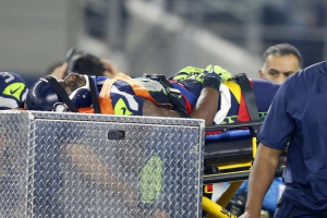 Arlington, TX, USA; Seattle Seahawks wide receiver Ricardo Lockette (83) is carted off the field after being injured in the second quarter against the Dallas Cowboys at AT&T Stadium.  <br/>Tim Heitman-USA TODAY Sports