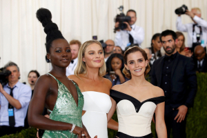Actresses Lupita Nyong'o (L), Margot Robbie (C), and Emma Watson arrive at the Metropolitan Museum of Art Costume Institute Gala (Met Gala) to celebrate the opening of 