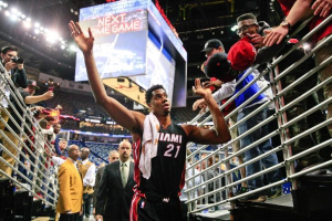 New Orleans, LA, USA; Miami Heat center Hassan Whiteside (21) celebrates with fans following a win against the New Orleans Pelicans in a game at the Smoothie King Center. The Heat defeated the Pelicans 113-99.   <br/>Derick E. Hingle-USA TODAY Sports