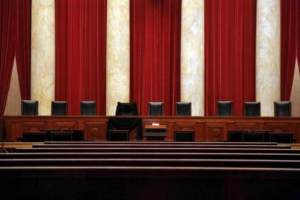 The bench of late Supreme Court Justice Antonin Scalia was draped with black wool crepe in memoriam inside the Supreme Court after his death in February 2016. <br/>Reuters 