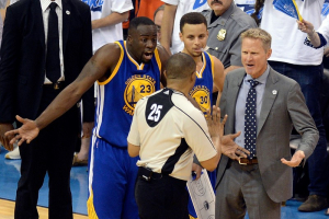 Oklahoma City, OK, USA; Golden State Warriors forward Draymond Green (23) and guard Stephen Curry (middle) and head coach Steve Kerr (right) argue with official Tony Brothers (25) during the first half against the Oklahoma City Thunder in game three of the Western conference finals of the NBA Playoffs at Chesapeake Energy Arena.  <br/>Mark D. Smith-USA TODAY Sports