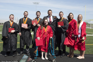 Septuplets Kenny, Kelsey, Natalie, Brandon, Alexis, Nathan, and Joel accepted their diplomas at the Carlisle High School in Iowa. Photo Credit: Rachel Mummey/The Register <br/>