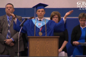 Class Valedictorian Jonathan Montgomery took the stage and led the class in reciting the Lord's Prayer. (CBN) <br/>