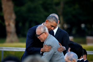 U.S. President Barack Obama (L) hugs an atomic bomb survivor Shigeaki Mori as he visits Hiroshima Peace Memorial Park in Hiroshima, Japan May 27, 2016. <br/> REUTERS/Carlos Barria