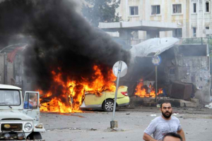 Civilians inspect the effect of ISIS bombing in Tartus City. <br/>Photo: Reuters
