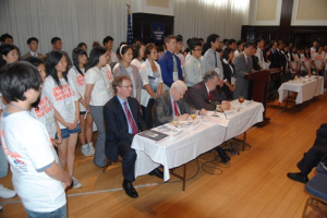 Some 70 Korean-American youths stand behind human rights and religious freedom experts declaring they will speak out on behalf of North Korean refugees and orphans at a press conference in Washington, D.C. on July 13, 2010. <br/>The Christian Post