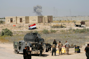 Iraqi security forces gather near Fallujah, Iraq, May 31, 2016.  <br/>REUTERS/Thaier Al-Sudani