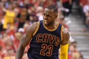 Toronto, Ontario, CAN; Cleveland Cavaliers forward LeBron James (23) reacts after dunking for a basket against Toronto Raptors in the second quarter of game four of the Eastern conference finals of the NBA Playoffs at Air Canada Centre.  <br/>Dan Hamilton-USA TODAY Sports