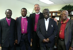 Archbishop Nicholas Okoh (left of center), new primate of the Church of Nigeria, stands with Bishop Martyn Minns (center) of the Convocation of Anglicans in North America, July 20, 2010. CANA is holding its annual council meeting in Herndon, Va., this week. <br/>The Christian Post