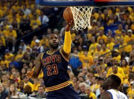 Oakland, CA, USA; Cleveland Cavaliers forward LeBron James (23) shoots the ball against Golden State Warriors forward Draymond Green (23) during the first quarter in game two of the NBA Finals at Oracle Arena.  <br/>Bob Donnan-USA TODAY Sports