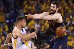 Jun 5, 2016; Oakland, CA, USA; Golden State Warriors guard Stephen Curry (30) passes the ball against Cleveland Cavaliers forward Kevin Love (0) during the first quarter in game two of the NBA Finals at Oracle Arena.  <br/>Kyle Terada-USA TODAY Sports