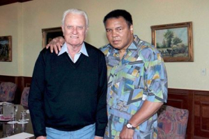 Muhammad Ali pictured with evangelist Billy Graham. <br/>Facebook/Franklin Graham