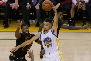 Golden State Warriors guard Stephen Curry (30) controls the ball against Cleveland Cavaliers center Tristan Thompson (13) and guard Iman Shumpert (4) during the second half in game five of the NBA Finals at Oracle Arena.  <br/>Kelley L Cox-USA TODAY Sports
