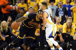  Oakland, CA, USA; Cleveland Cavaliers guard J.R. Smith (5) drives to the basket against Golden State Warriors guard Stephen Curry (30) during the third quarter in game five of the NBA Finals at Oracle Arena.  <br/>Bob Donnan-USA TODAY Sports