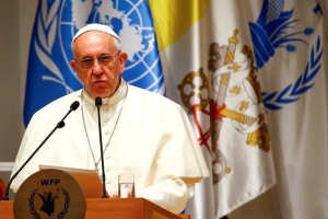 Pope Francis delivers his speech during a visit at the United Nations World Food Programme (WFP) headquarters in Rome, Italy June 13, 2016.  <br/>REUTERS/Tony Gentile