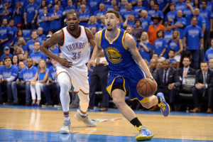May 28, 2016; Oklahoma City, OK, USA; Golden State Warriors guard Klay Thompson (11) drives to the basket in front of Oklahoma City Thunder forward Kevin Durant (35) during the third quarter in game six of the Western conference finals of the NBA Playoffs at Chesapeake Energy Arena.  <br/>Mark D. Smith-USA TODAY Sports