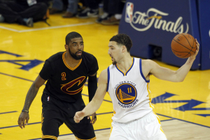 June 19, 2016; Oakland, CA, USA; Golden State Warriors guard Klay Thompson (11) controls the ball against Cleveland Cavaliers guard Kyrie Irving (2) in the second half in game seven of the NBA Finals at Oracle Arena.  <br/>Cary Edmondson-USA TODAY Sports