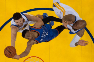 Oakland, CA, USA; Oklahoma City Thunder guard Russell Westbrook (0) shoots the basketball against Golden State Warriors guard Klay Thompson (11) and center Marreese Speights (5) during the first half of game seven of the Western conference finals of the NBA Playoffs at Oracle Arena. The Warriors defeated the Thunder 96-88.  <br/>Kyle Terada-USA TODAY Sports