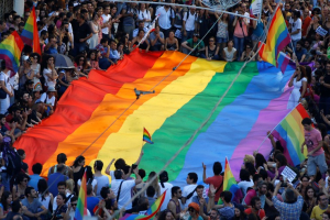 Gay rights activists carry a rainbow flag during a protest at Tunel Square in Istanbul.  <br/>REUTERS/Marko Djurica
