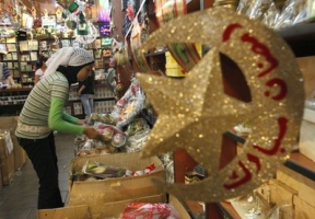 A Lebanese Muslim woman, shops for decorations in preparation for the Islamic holy month of Ramadan, in Beirut, Lebanon, Monday Aug. 9, 2010. Muslims traditionally decorate their homes, shops and streets for the holy month of Ramadan. Muslims throughout the world will be celebrating the holy fasting month of Ramadan, the holiest month in the Islamic calendar, refraining from eating, drinking, smoking and sex from sunrise to sunset. <br/>AP Photo / Hussein Malla