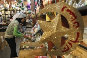A Lebanese Muslim woman, shops for decorations in preparation for the Islamic holy month of Ramadan, in Beirut, Lebanon, Monday Aug. 9, 2010. Muslims traditionally decorate their homes, shops and streets for the holy month of Ramadan. Muslims throughout the world will be celebrating the holy fasting month of Ramadan, the holiest month in the Islamic calendar, refraining from eating, drinking, smoking and sex from sunrise to sunset. <br/>AP Photo / Hussein Malla