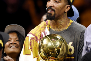 Oakland, CA, USA; Cleveland Cavaliers guard J.R. Smith (5) with the Larry O'Brien Championship Trophy after beating the Golden State Warriors in game seven of the NBA Finals at Oracle Arena.  <br/>Bob Donnan-USA TODAY Sports