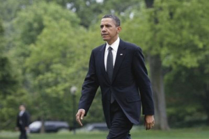 In this April 25, 2010 file photo, President Barack Obama returns to the White House in Washington. <br/>AP Images / J. Scott Applewhite, File
