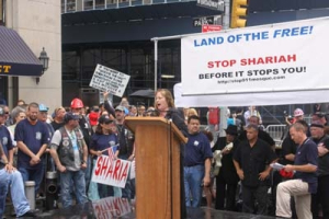 Protesters listen to Beth Gilisky, coordinator of Sunday's rally in opposition to the mosque near ground zero in lower Manhattan. The Aug. 22, 2010, rally drew some 700 protesters. <br/>The Christian Post