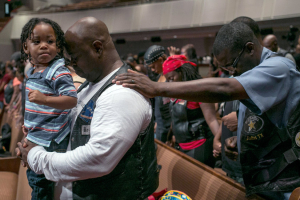 The service at Friendship-West Baptist Church in Dallas on Sunday focused on prayers for the two black men and the police officers killed last week.<br />
 <br/>CreditIlana Panich-Linsman for The New York Times