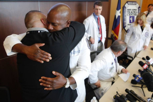 Dr. Brian H. Williams, a trauma surgeon at Parkland Memorial Hospital, visits at the hospital, Monday, July 11, 2016, in Dallas. Williams treated some of the Dallas police officers who were shot Thursday night in downtown Dallas.  <br/>Eric Gay / AP