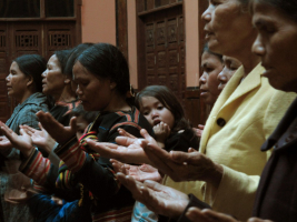 Christians worship at a home church in Vietnam. <br/>Associated Press/Photo by Chris Brummitt