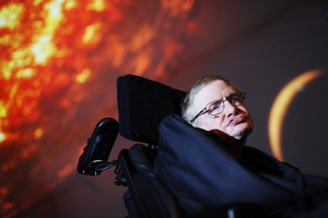 In this April 29, 2010, file photo, Stephen Hawking watches the first preview of his new show for the Discovery Channel, Stephen Hawking's Universe. <br/>AP Photo: / PA Wire, David Parry